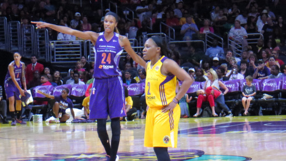 Phoenix's DeWanna Bonner and Los Angeles guard Temeka Johnson.