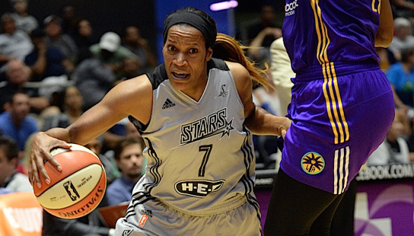 Jia Perkins of the San Antonio Stars drives to the basket against the Los Angeles Sparks  Copyright 2015 NBAE (Photos by D. Clarke Evans/NBAE via Getty Images)