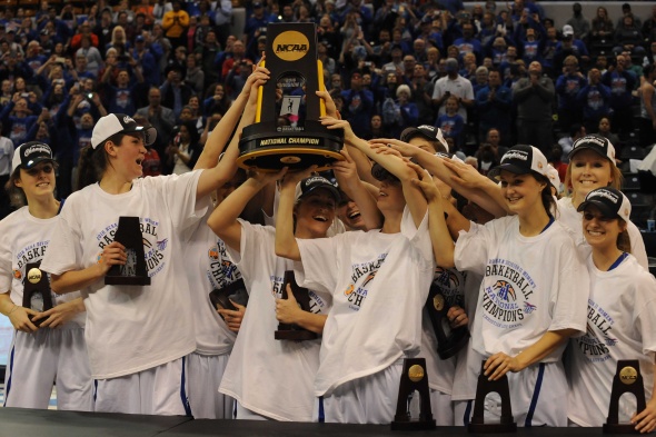 The Lubbock Christian Lady Chaps hoist the NCAA Division II National Championship Trophy after defeating Alaska Anchorage, 78-73, in Indianapolis on Monday. Photo © Lee Michaelson, all rights reserved.