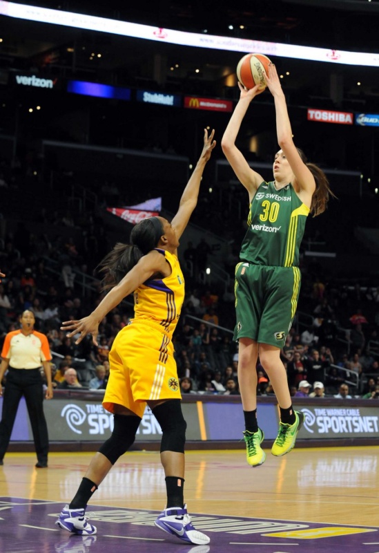 Seattle's Breanna Stewart skies to shoot over L.A.'s Nneka Ogwumike. Photo © Lee Michaelson, all rights reserved.