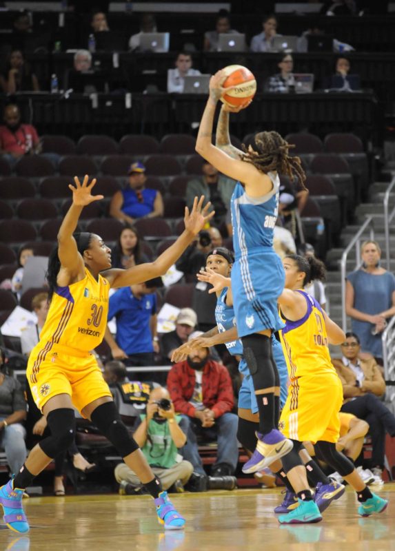 Oct. 14, 2016 - Lynx's Seimone Augustus shoots over Sparks' Nneka Ogwumike in Game 3 of the WNBA Finals. Photo © Lee Michaelson, all rights reserved.