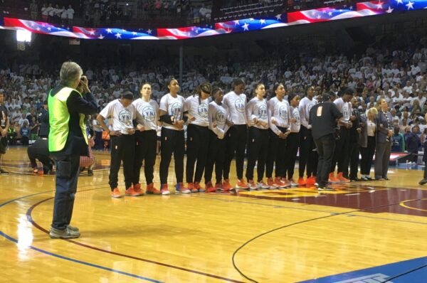 September 24, 2017 (Minneapolis) - Minnesota Lynx players stand with linked arms during national anthem before game one of the WNBA Finals. Los Angeles Sparks players decided to stay in the locker room during the anthem. Photo: © Lee Michaelson.