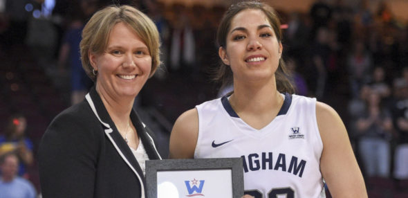 March 8, 2016; Las Vegas, NV, USA; BYU Cougars forward Kalani Purcell (32) receives her WCC All-Tournament Team award from WCC commissioner Lynn Holzman against the San Francisco Dons after the game of the WCC Basketball Championships at Orleans Arena. Photo: WCC.