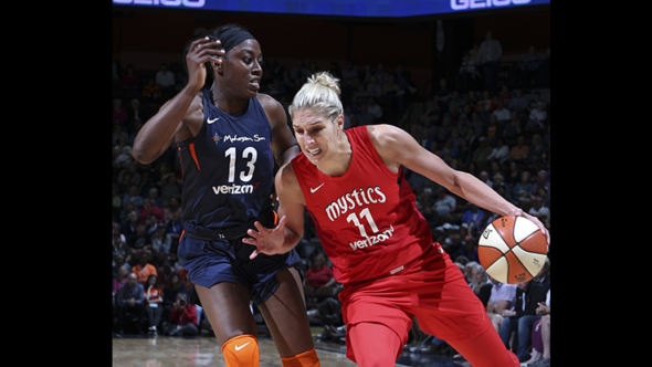 WASHINGTON, D.C. (June 26, 2018) - Elena Delle Donne dribbles past Chiney Ogwumike. Photo: NBAE/Getty Images.