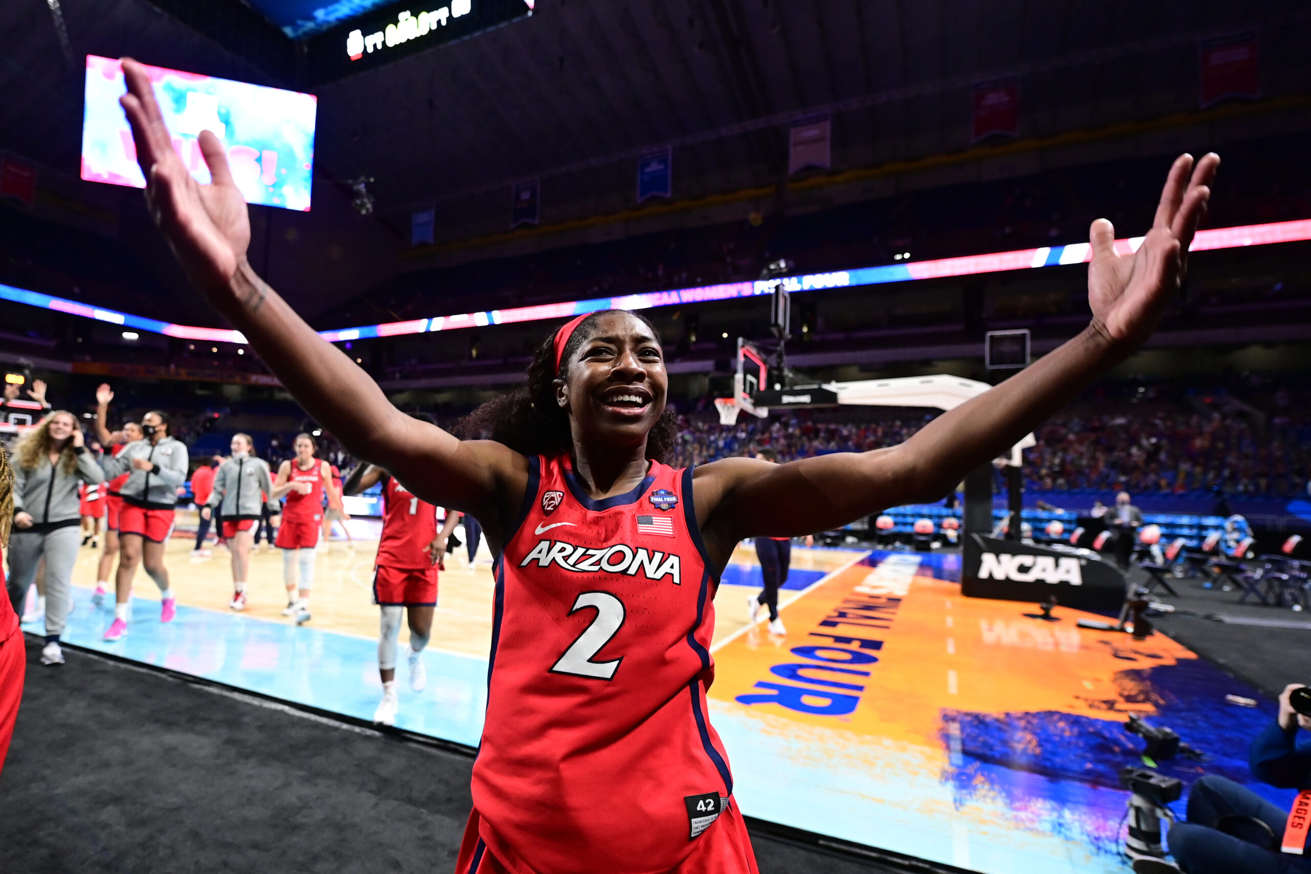 SAN ANTONIO, TX - APRIL 2: Aari McDonald #2 of the Arizona Wildcats celebrate their win over the Connecticut Huskies in the semifinals of the NCAA WomenÕs Basketball Tournament at Alamodome on April 2, 2021 in San Antonio, Texas. (Photo by Ben Solomon via Getty Images)