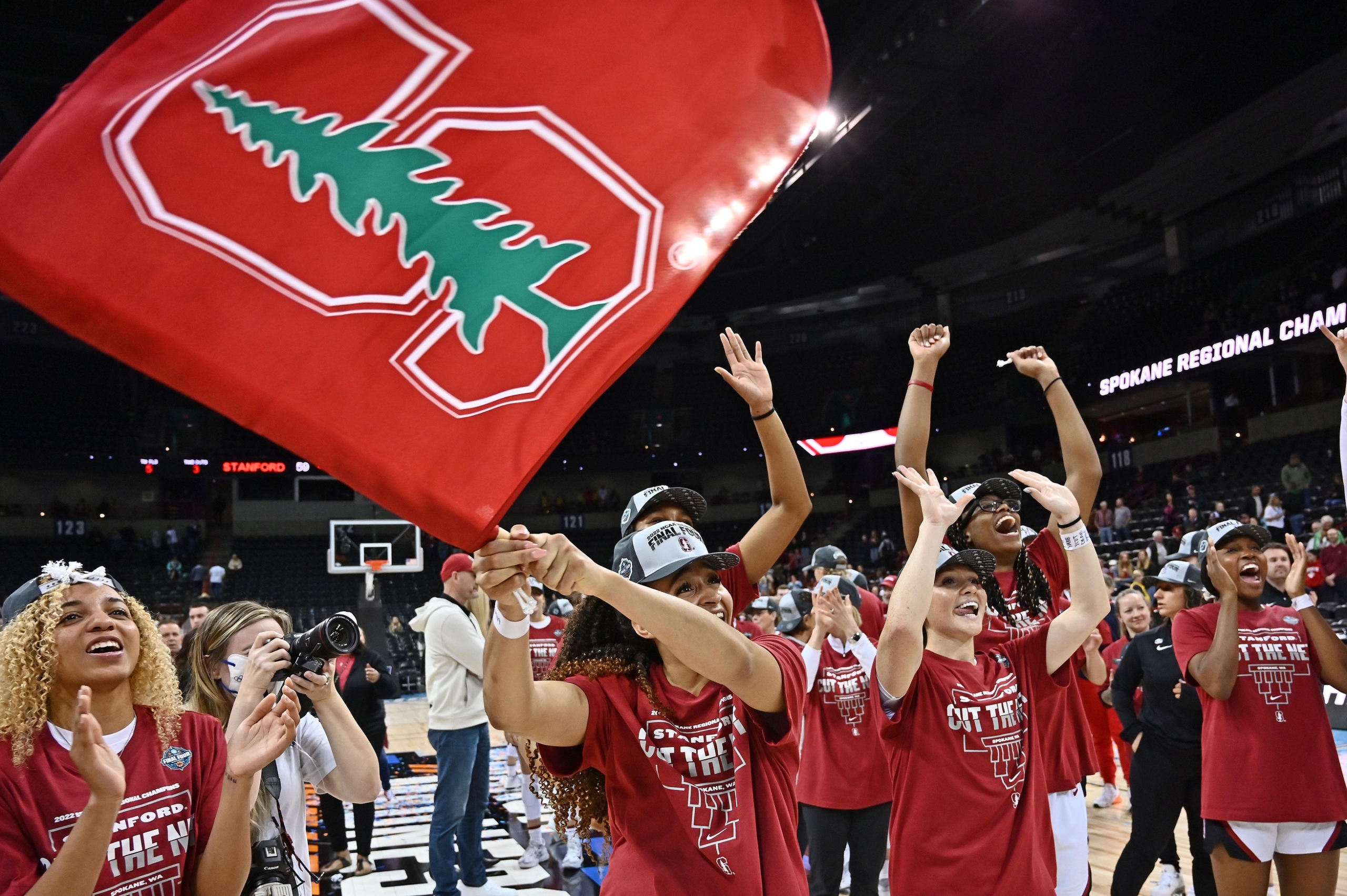 Mar 27, 2022; Spokane, WA, USA; Stanford Cardinal guard Haley Jones (30) waves the school flag after a game against the Texas Longhorns. Credit: James Snook-USA TODAY Sports