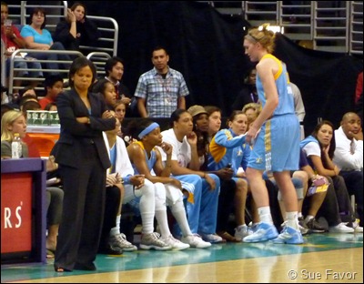 Carolyn Swords comes out of the game in the first quarter, while Coach Pokey Chatman looks on