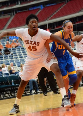 December 8, 2012 (Houston, Texas) – UCLA vs. Texas, Reliant Arena. Texas player Cokie Reed boxes out UCLA's Thea Lemberger. Photo © Robert Franklin, all rights reserved.