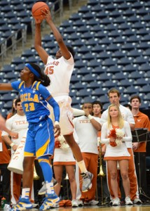 December 8, 2012 (Houston, Texas) – UCLA vs. Texas, Reliant Arena. Texas player Cokie Reed shoots over Markel Walker. Photo © Robert Franklin, all rights reserved.