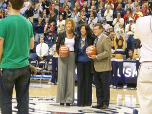 Chris Daily and Geno Auriemma honored before the game.