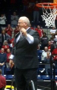 Marist coach Brian Giorgis cutting down the net.