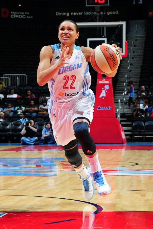 ATLANTA, GA -MAY 13: Armintie Herrington #22 of the Atlanta Dream drives to the basket against the Brazilian National Team during the WNBA game at Philips Arena on May 13, 2013 in Atlanta, Georgia. NOTE TO USER: User expressly acknowledges and agrees that, by downloading and/or using this Photograph, user is consenting to the terms and conditions of the Getty Images License Agreement. Mandatory Copyright Notice: Copyright 2013 NBAE. (Photo by Scott Cunningham/NBAE via Getty Images)