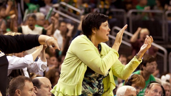 Karen Bryant (right) cheering on the Storm at KeyArena. Neil Enns/Storm Photos.