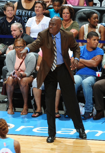 Head Coach Michael Cooper of the Atlanta Dream calls a play against the Chicago Sky on June 7, 2014 at Philips Arena in Atlanta, Georgia.   Photo: Scott Cunningham/NBAE.
