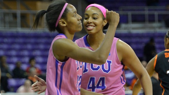 February 20, 2013, Fort Worth, Texas - Delisa Gross (22) and Ashley Colbert (44) celebrate. TCU defeated No. 23 Oklahoma State 64-63. Photo: TCU Athletics.