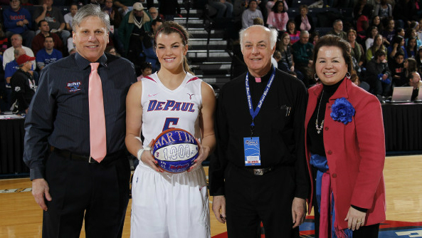 Anna Martin honored for reaching the 1,000 career-point mark before the DePaul's game vs. Marquette on February 12. Photo: DePaul Athletics.