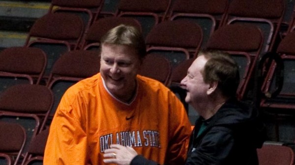 Kurt Budke jokes with Leon Barmore during the 2011 Big 12 tournament in March.