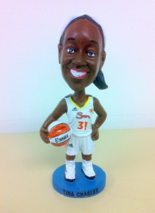 Tina Charles bobblehead handed out at the game.